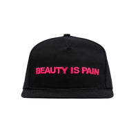 BEAUTY IS PAIN HAT by GOLF WANG